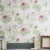 Wallpaper from the 'Spring Wild Rain Collection' capturing the fresh beauty of spring florals on a white rustic background, reminiscent of a garden after a rain shower.