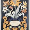 Decorative inlay wall panel with a rich floral design set against a dark background, a statement piece for refined interior aesthetics.