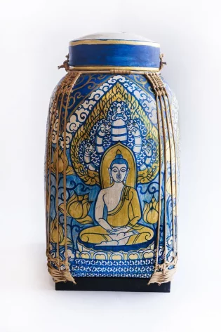 Colorful hand-painted Buddha on Bamboo Thai Rice Baskets, set against a white background, embodying the essence of Thai culture and tradition.
