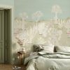 Desert Green Sand wallpaper adds a subtle, nature-inspired ambiance to a bedroom, with its delicate depiction of desert plants and sandy tones.