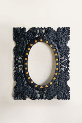 Best selling art, upcycled teak wood mirror frame with black and gold accents.