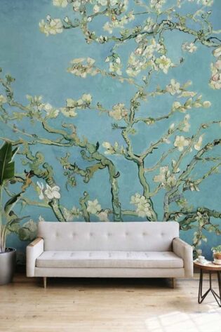 Elegant wallpaper inspired by Van Gogh's Almond Blossom painting, with beautiful flowering branches against a soft blue backdrop, adding a touch of artistic serenity to the room.
