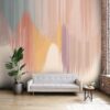 Wallpaper with abstract paint strokes in a palette of warm and pastel hues, offering a contemporary and artistic flair to the living room environment.