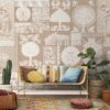 Stylish Geet wallpaper showcasing abstract folk motifs in earthy tones, creating a contemporary yet culturally rich backdrop for a cozy living space with decorative pillows and plants.