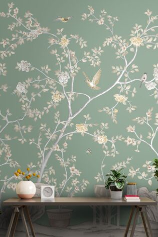 Wall adorned with Phoolbagh wallpaper, displaying a graceful floral pattern on a soft green background, evoking the charm of a peaceful botanical garden.